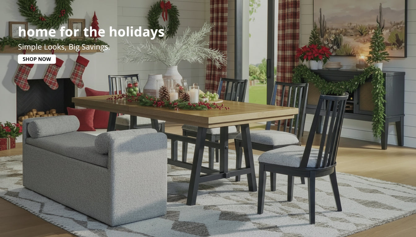 Dining room with wooden table, chairs, and a gray bench in a home setting.
